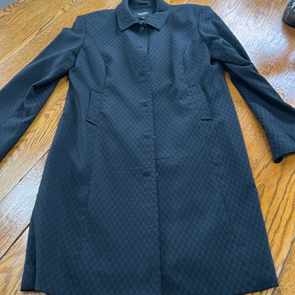 Express Stretch black waffle print lined coat.  Size 13/14.  Good condition.